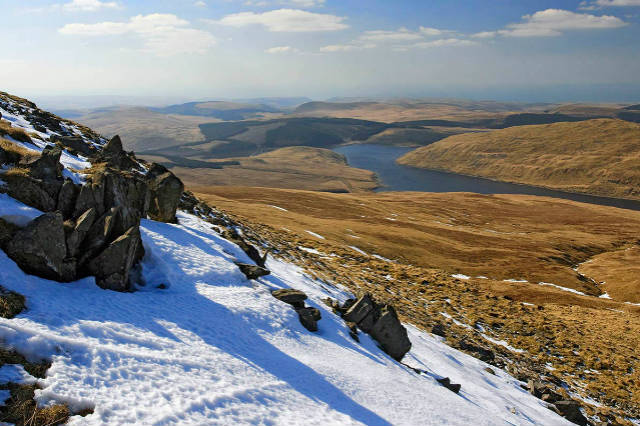 View from top of Cambrian Mountains with snow on top