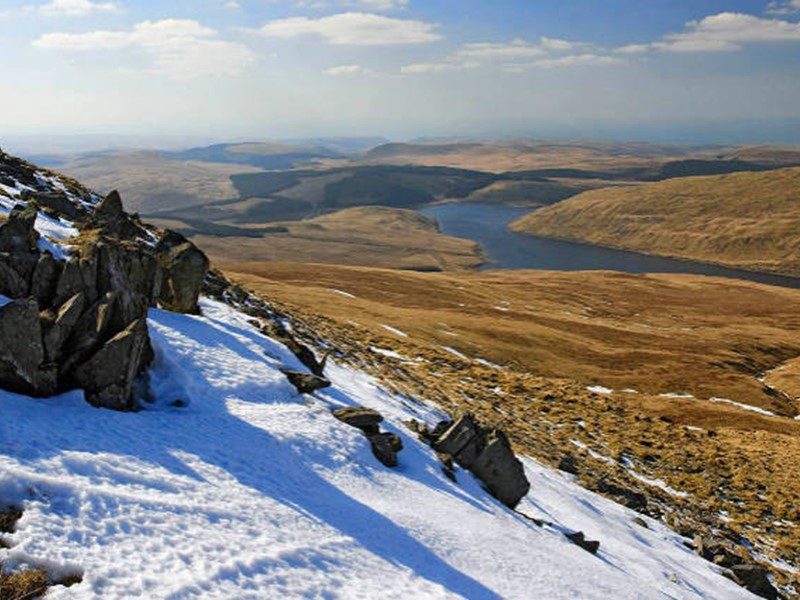 View from top of Cambrian Mountains with snow on top